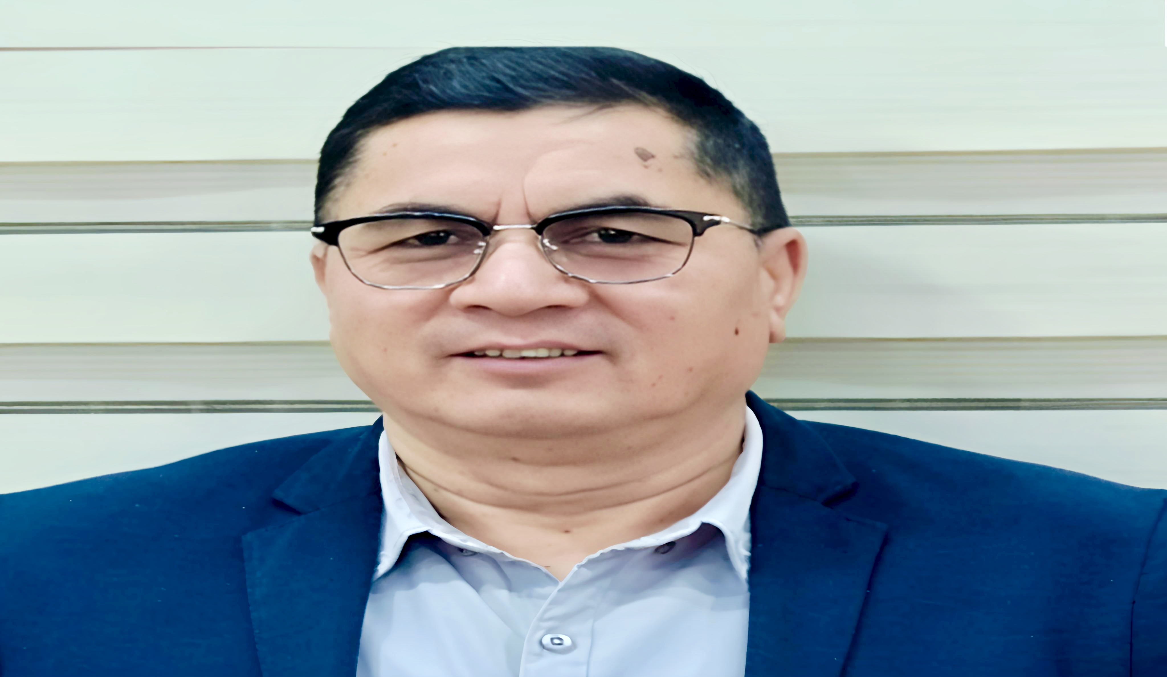 Dr. Meharban Singh Bisht